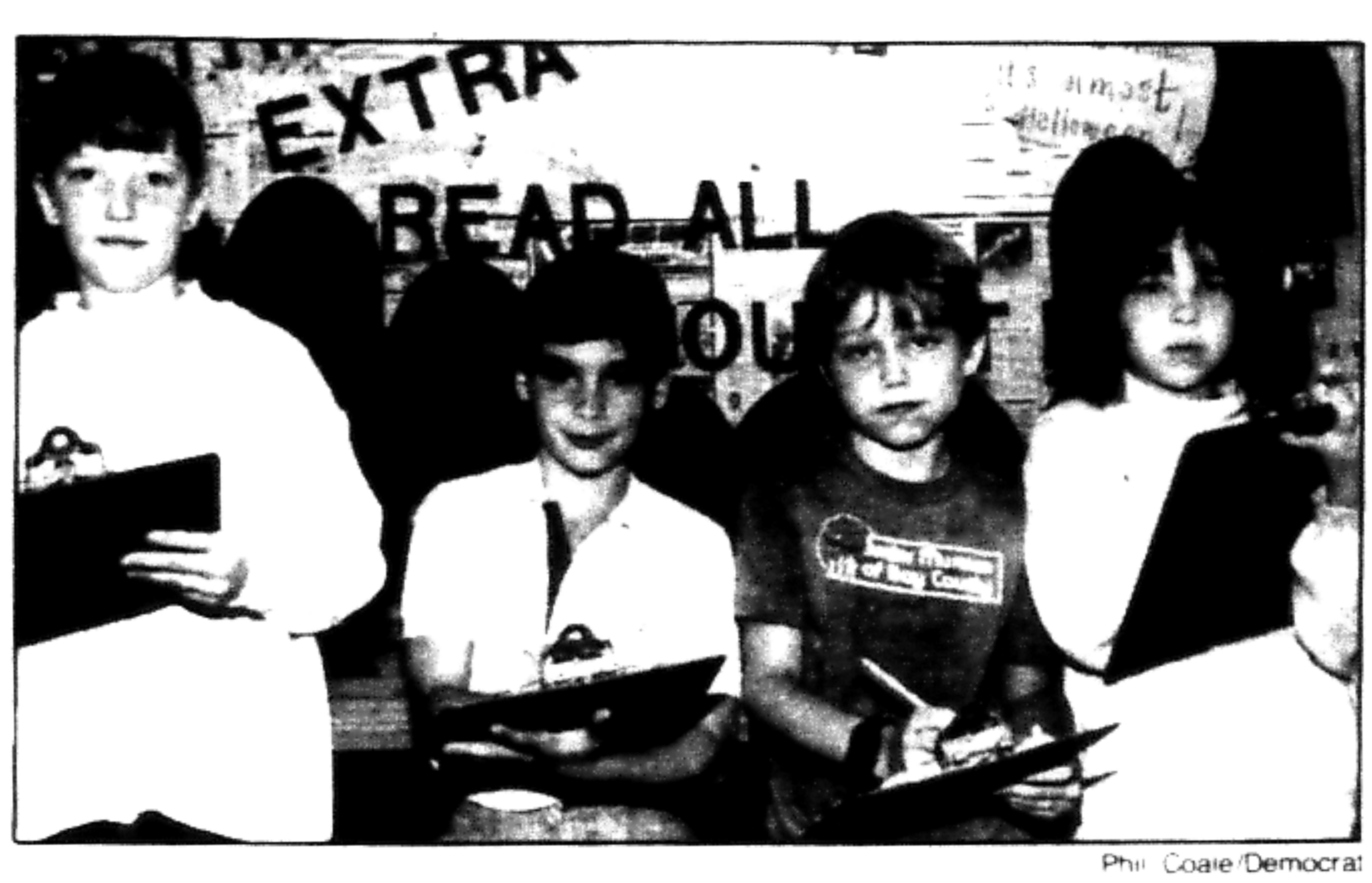 The organizers of the Halloween donation drive, from left Kelly Collette, Hamilton Gilberg, Matthew Cooper and Rebecca Nelson. Photograph by Phil Cole, Tallahassee Democrat. Reproduced with permission from the editorial staff of the Tallahassee Democrat.