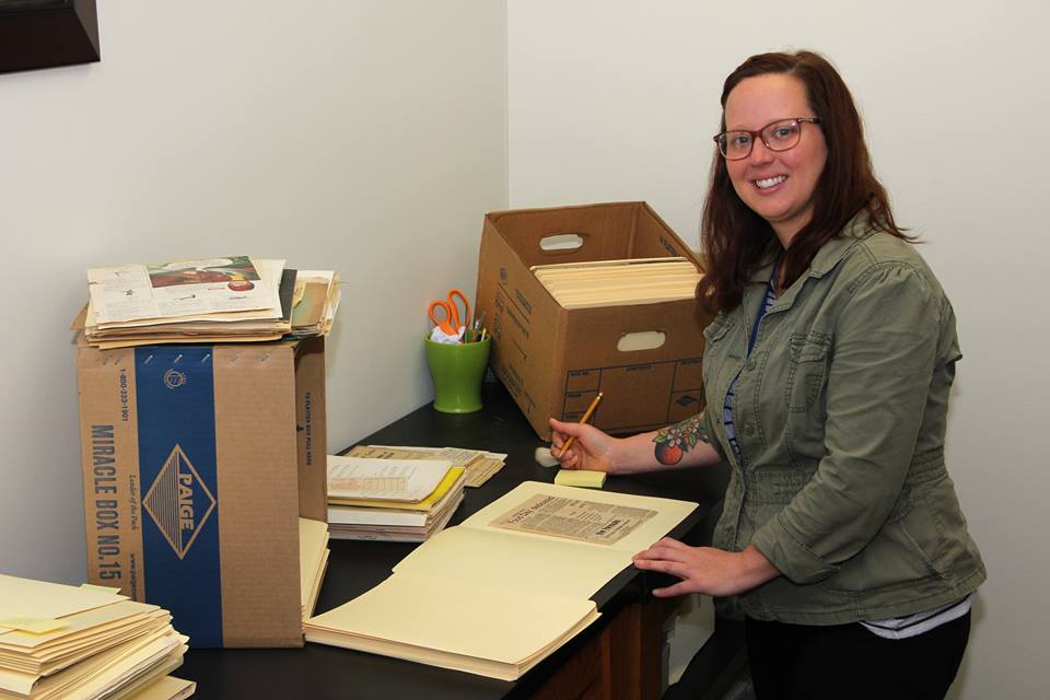 Collections Management Archvist, Tyeler McLean. Before a patron can make use of an archival collection, an archivist must arrange and describe the materials first. 