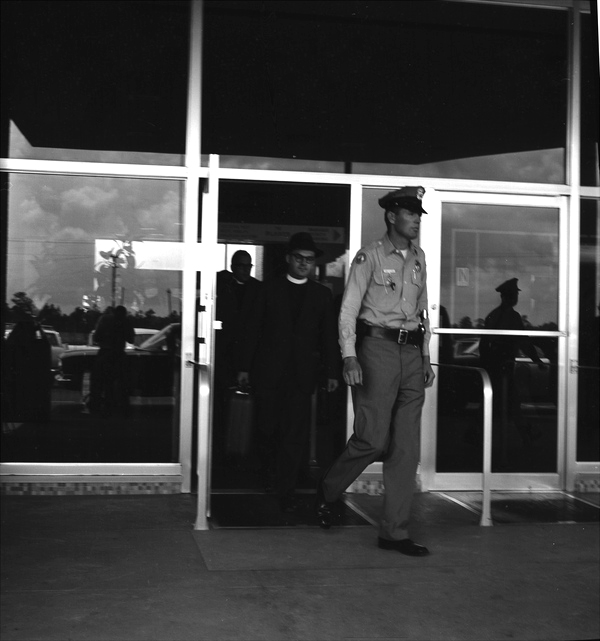 Reverend Robert J. Stone, from New York City, being arrested with the 