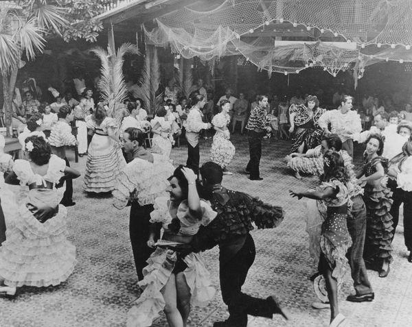 Conga line dancing at a carnival in Key West