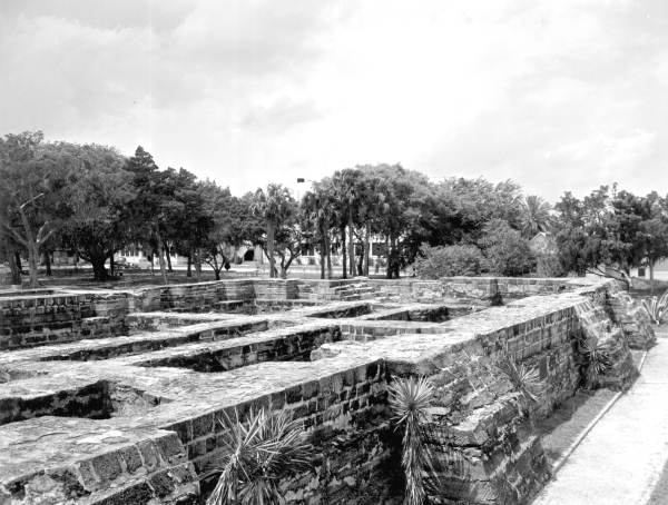 Remains of a building from Andrew Turnbull's New Smyrna colony. The structure was built of coquina cement around 1768 and was used as a warehouse. The building was built on top of a large Native American shell mound (photo 1953).