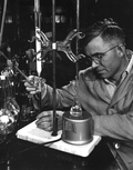 A research chemist working at the U.S. Naval Stores Experimental Station - Olustee, Florida.