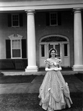 1959 Jeanie Ball contest winner Veronica McCormick standing in front of museum for portrait at the Stephen Foster Memorial - White Springs, Florida