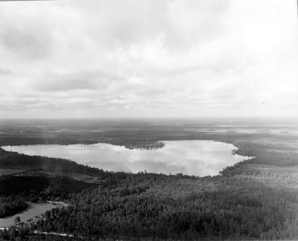 An aerial view of the Disney property near Orlando and Kissimmee prior to the park's opening (1967).