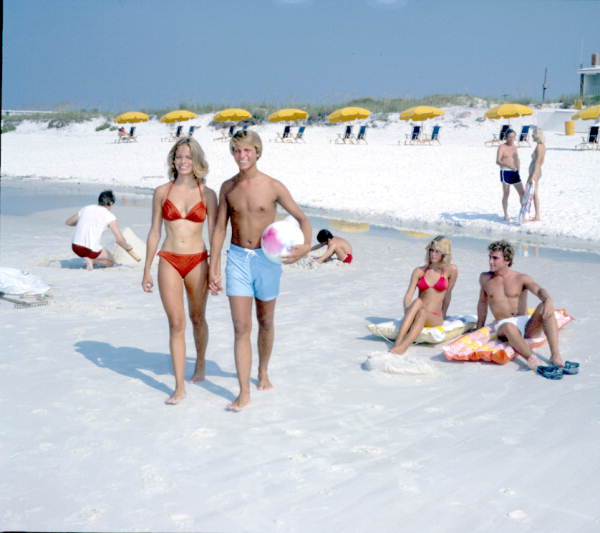 Tourists enjoying a day at Fort Walton Beach (1981).