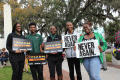 FAMU students with their signs at the Never Again Rally in Tallahassee.