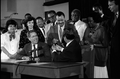 Governor Bob Martinez passes out pens after signing the Martin Luther King bill - Tallahassee, Florida.