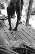 Alphonso Jennings laying white oak into a pattern to begin making a basket - Lamont, Florida