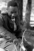 Alphonso Jennings cutting white oak into strips to make a basket - Lamont, Florida