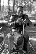 Alphonso Jennings cutting white oak into strips to make a basket - Lamont, Florida