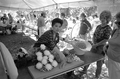 Pam Maneeratana demonstrating Thai fruit and vegetable carving at the 1988 Florida Folk Festival - White Springs, Florida