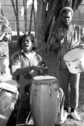 Frederick Massena, left, and Jamail Malcolm X Cesar of the Haitian Rara band Konbo Guinyn performing - Miami, Florida.