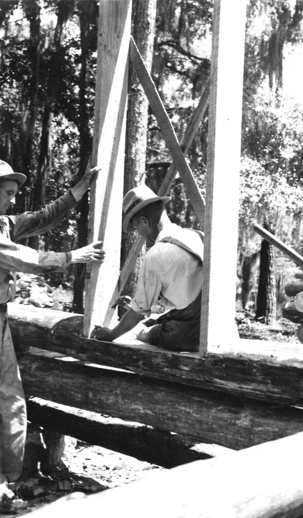 CCC workers construct mess hall at the Oleno forestry training camp in Columbia County, Florida, 1935. With the establishment of the Florida Park Service, thousands of unemployed Floridians were put to work by the CCC to develop state parks for public use.