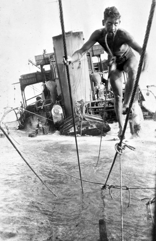 Salvaging a British vessel torpedoed off Cocoa Beach, 1943