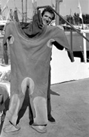 Roller with a sponge diving suit while conducting fieldwork for the Maritime Heritage Survey: Tarpon Springs, Fla.(1986)