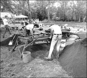 Workers searching for items left behind from the past (1987)