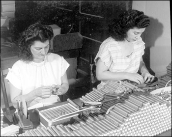 Mirta Perez and Angie Valdez working on cigar packaging process: Tampa, Florida (1947)