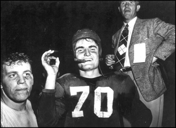 Close up view of football players and coaches: Miami, Florida (1950)