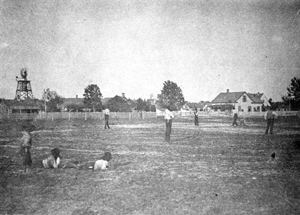 African American boys watching a baseball game: Apalachicola, Florida (ca. 1895)