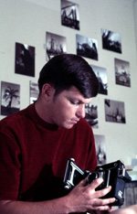 Sergeant 2nd Class Dale M. McDonald, base photographer, in his barracks room (1971)