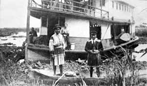 Seminole canoe encounters steam ship (late 1800s)