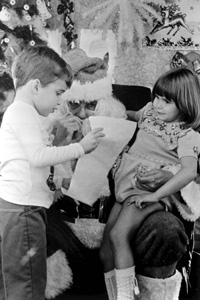 State Senator Bob Graham working as Santa Claus at Clark LaSalle Cleaners: Coral Gables, Florida (1977)