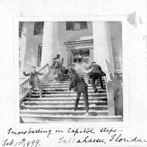 Men snowballing on capitol steps: Tallahassee, Florida (1899)