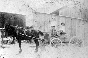 Japanese men in horse drawn cart: Yamato, Florida (ca. 1912)