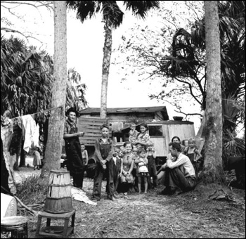 Family of migrant agricultural workers: Canal Point, Florida (1939)