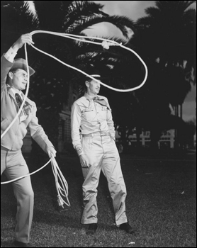 Directors of cowboy week, Hal Davis, left, and Donald Kay, right, practice up on rope tricks: Ocala, Florida (1948)