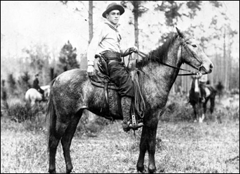 Cowboy at an open range roundup near Fort McCoy: Florida (c. 1910)