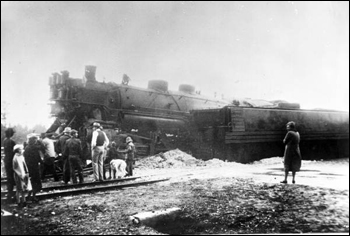 People stand near the train wreck: Lloyd, Florida (1937)