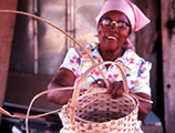 Lucreaty Clark completing her white oak basket