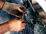 Rickey Doublerly knitting a fishing net: Jacksonville, Florida (1988)