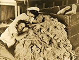 Boys sleep in the fish house on the idle nets (1939)