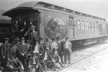 Men standing by Barnum & Bailey circus railroad car