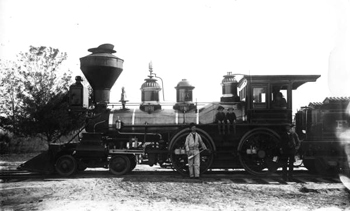 Boys and crew posed with Florida Railway and Navigation Company engine number 16