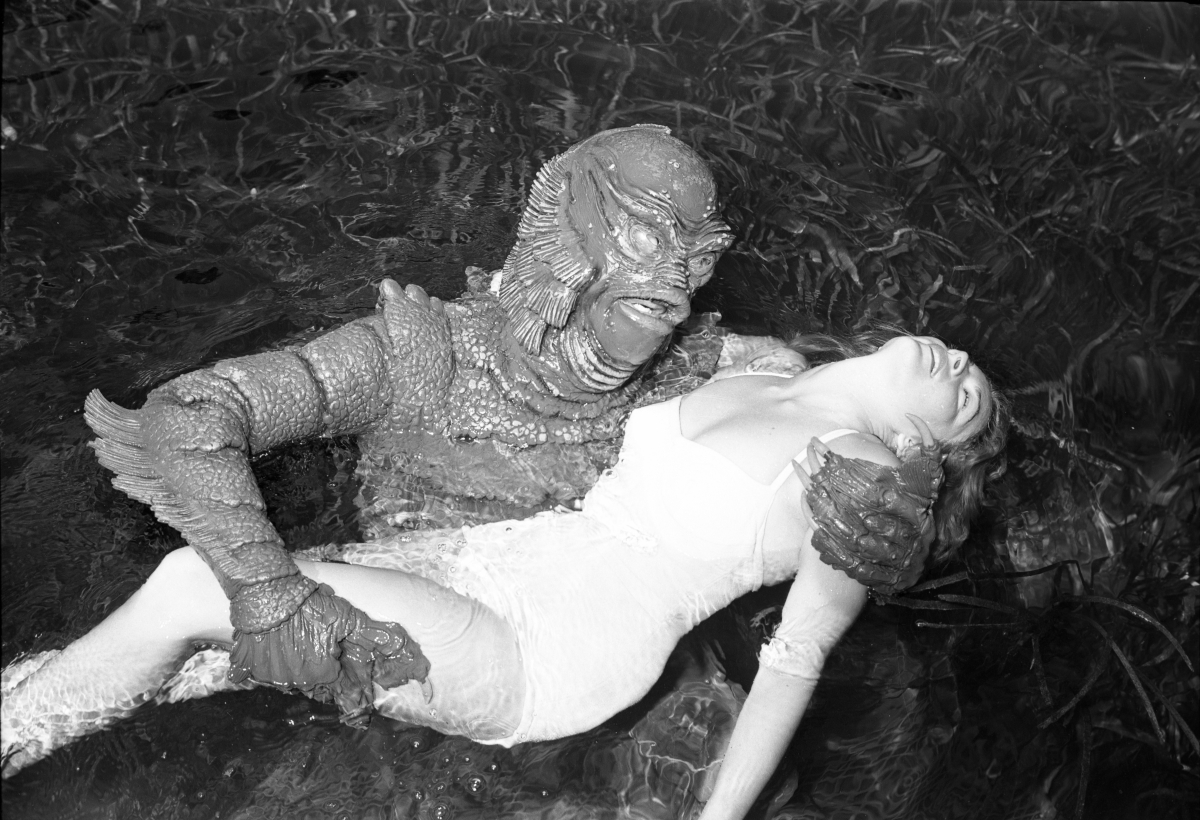 Ginger Stanley in the grip of the Gill Man for a promo still at Silver Springs, 1955. Photo by Bruce Mozert.