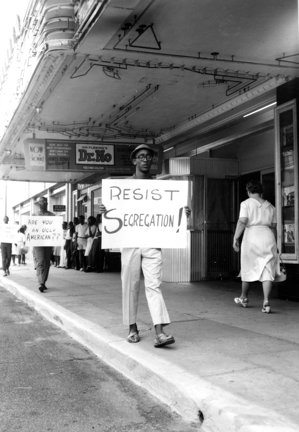 The slow pace of social change in Florida prompted many African-Americans to take action. In the above picture, dated 1962, young men and women stand outside the Florida Theatre in Tallahassee, calling on white America to reevaluate racial segregation. Eight years after the Brown decree only a handful of school districts in Florida were desegregated. Miami-Dade was the first in 1959. State Archives of Florida, Florida Memory.