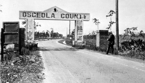 Several counties established gateways like this one welcoming Dixie Highway travelers (circa 1920).