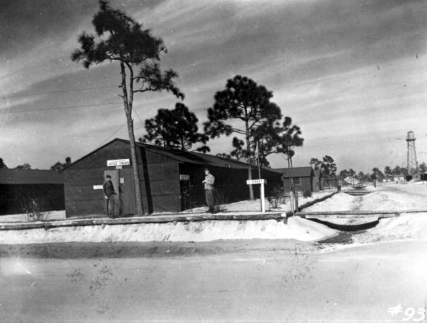 Barracks at Camp Gordon Johnston. Notice that the walls are little more than tar paper on a wooden frame (circa 1943).