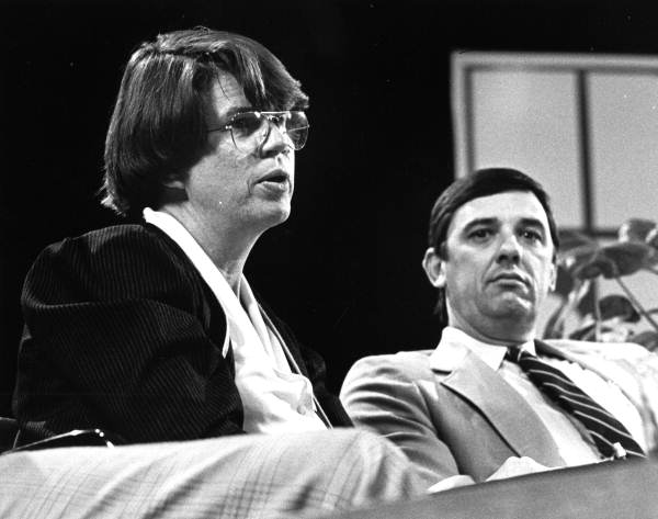 Dade County State Attorney, Janet Reno, seated next to Director of Metro Public Safety, Bobby L. Jones during forum entitled 