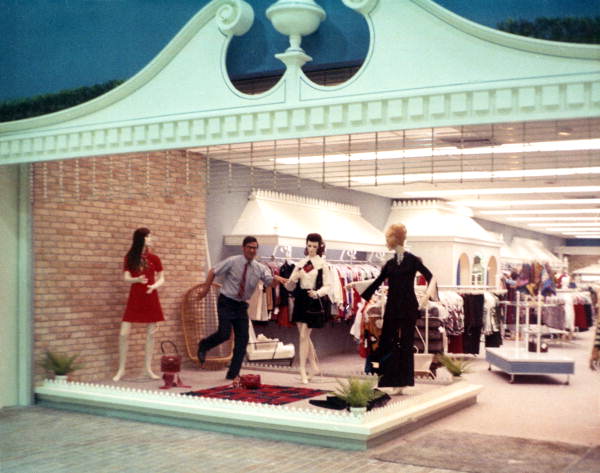 View of man posing with mannequins at Colony store in the Northwood Mall on opening day - Tallahassee, Florida