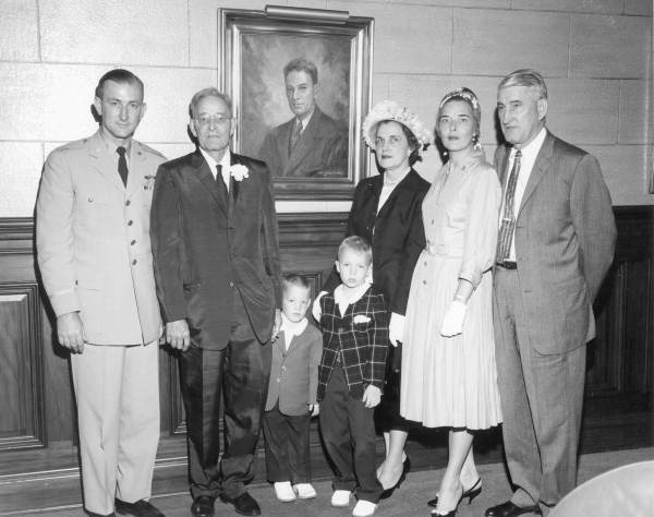 Samuel W. Getzen (second from left) with his family upon the unveiling of his portrait in the chamber of the Florida House of Representatives.  Getzen had been the Speaker of the Florida House in 1929.  Photo dated 1959.