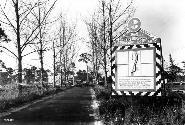 This somewhat complicated sign warned motorists of an approaching railroad crossing along the Dixie Highway (1924).