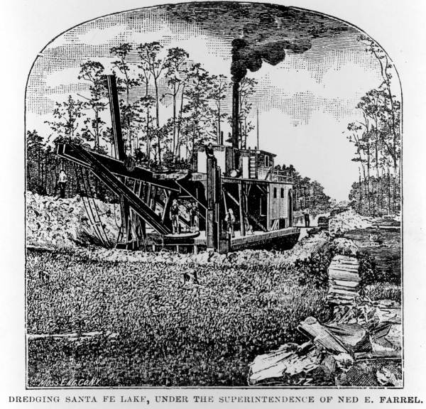 Workers digging the Waldo Canal with the aid of a dredge built especially for the project (1883).