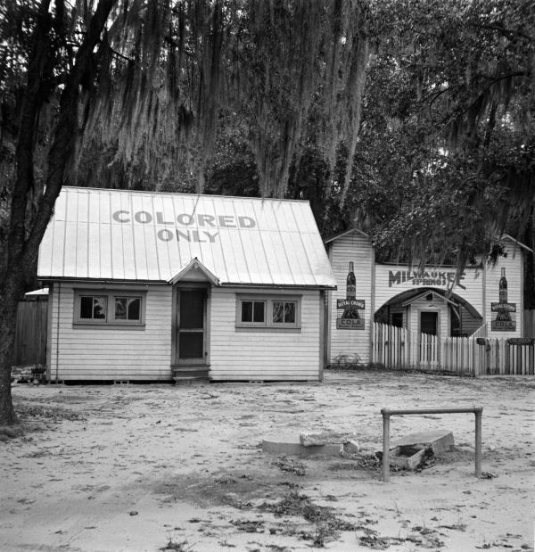 Taken by photographer Charles Foster, this is the only image Florida Memory has of Milwaukee Springs, a segregated recreational area for African-Americans in Alachua County.  Documentary evidence suggests it was located northwest of Gainesville (circa 1940).