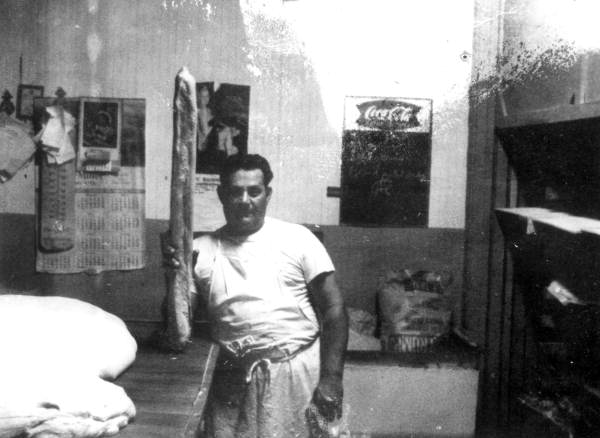 John Ferlita with bread at his bakery in Tampa (circa 1960s).