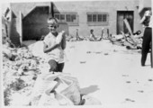 Art McKee's son, Mick, posing with items at his father's museum - Plantation Key, Florida