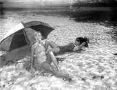 Portrait of Ginger Stanley and Merle Ivey posing underwater at Weeki Wachee Springs near Brooksville.